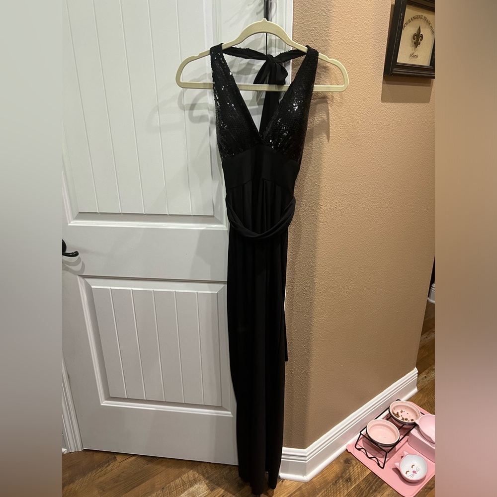Black halter top, sequin pants jumper, flared leg